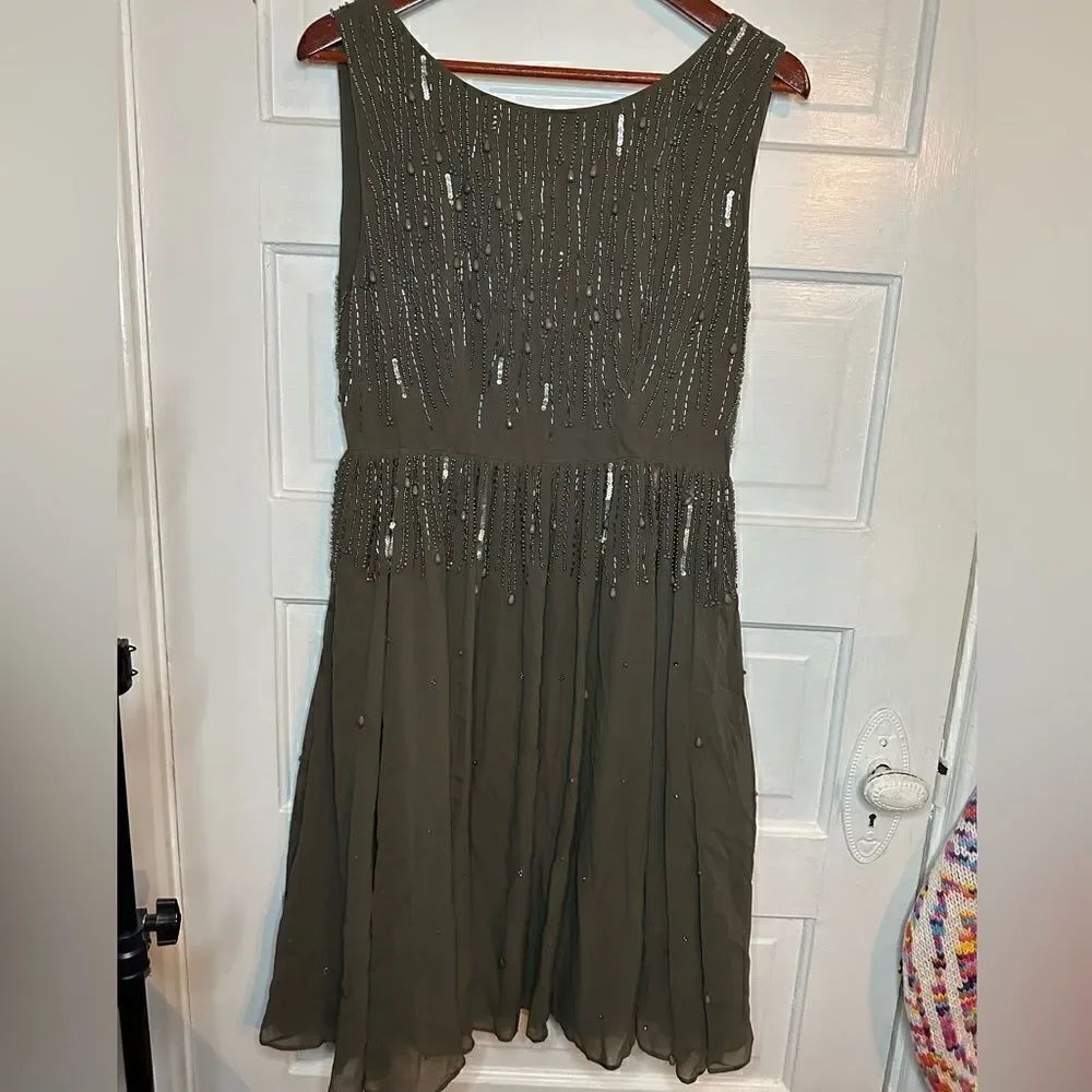 NWOTs Burning Torch Cocktail Dress Size Medium